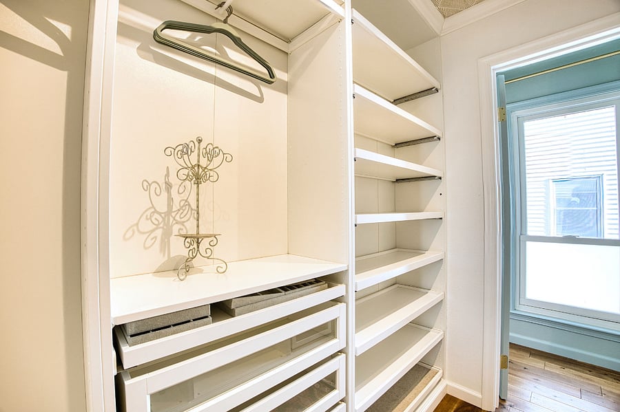 Master closet has ample shelving and storage