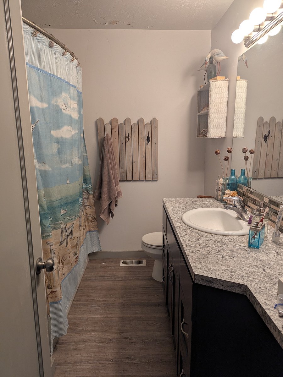 Full bath with plenty of storage