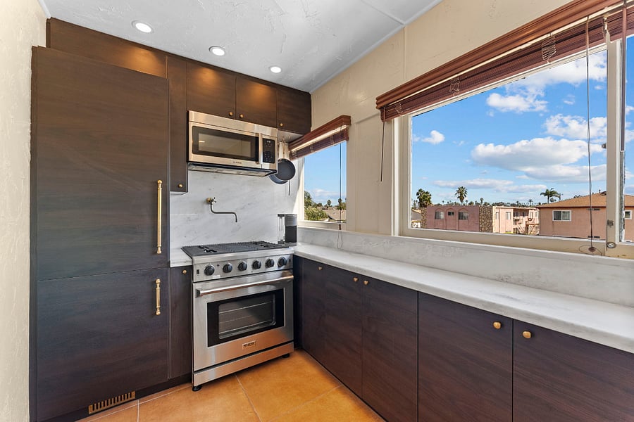 Apartment sized refrigerator, 5 burner Thor stove, microwave and pot/kettle filler for your convenience.