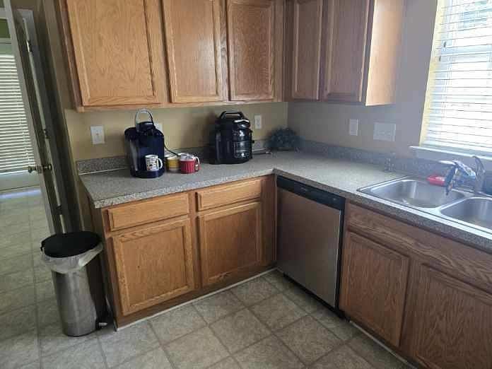 The kitchen is fully equipped with everything you need  stainless steel dishwasher, coffee maker, air fryer, ample cabinets, and a double sink. Perfect for preparing meals during your stay.