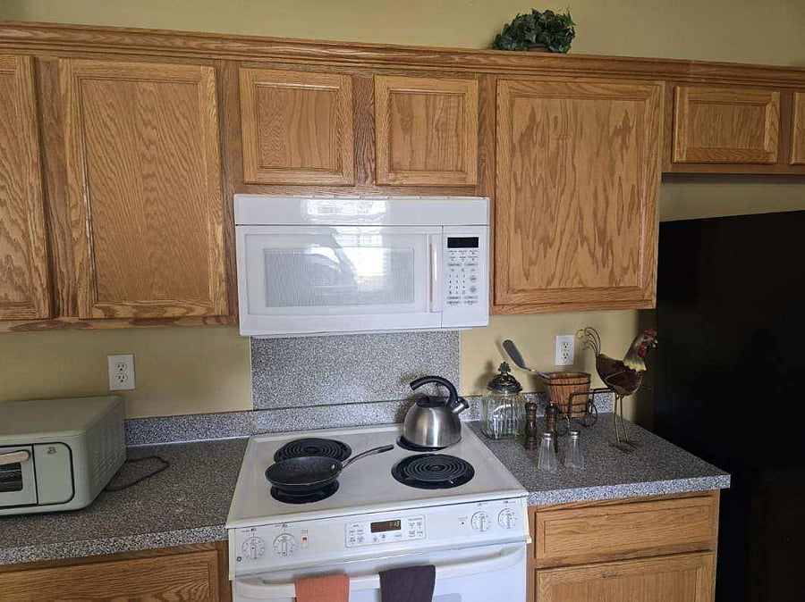 The kitchen is fully equipped with everything you need  stainless steel dishwasher, coffee maker, air fryer, ample cabinets, 