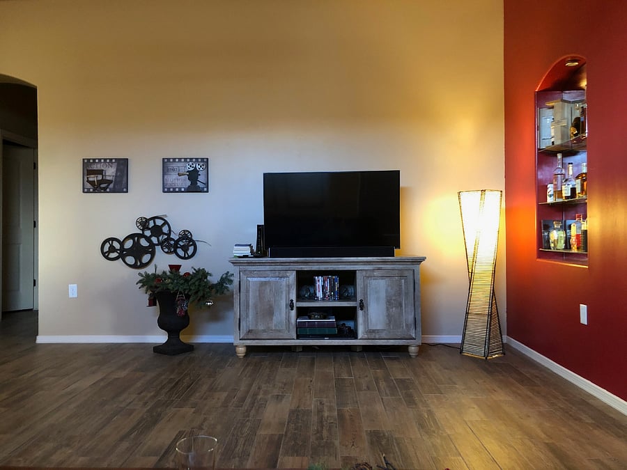 Bigger 65" Smart TV is now mounted to the wall. Picture to get a feel for setup and style.