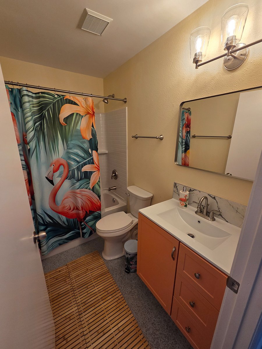 shared bathroom with new tub/shower. 