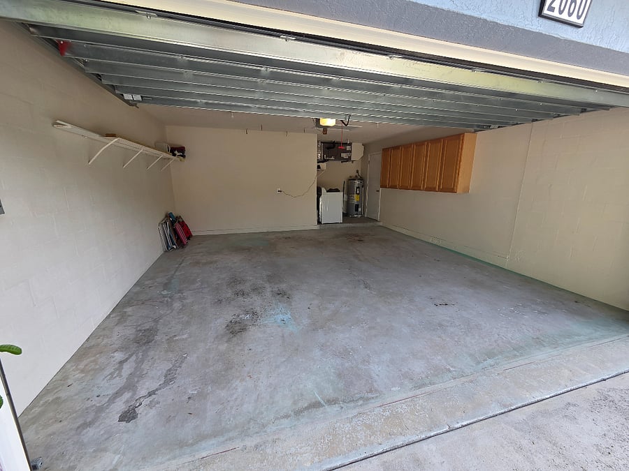 2 car garage with storage and laundry
