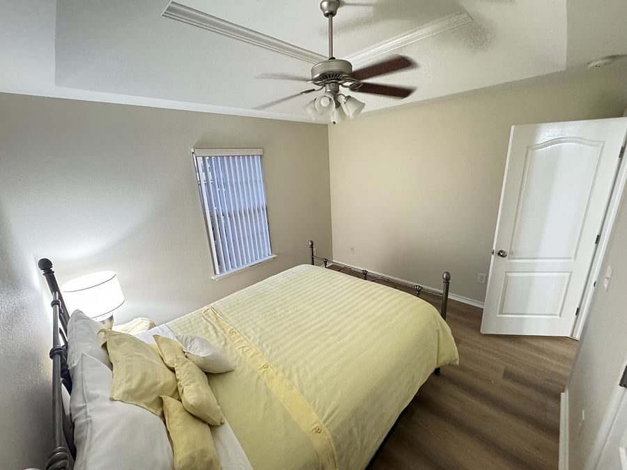 Cozy and quiet 2nd guest room with queen bed, and plenty of natural light.