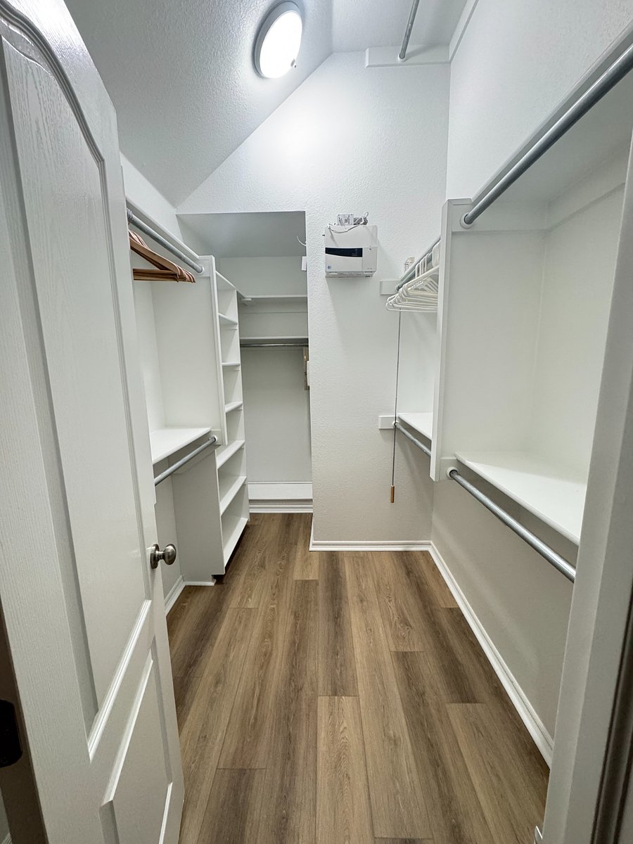Spacious main walk-in closet offering plenty of storage. Designed for comfort and relaxation.