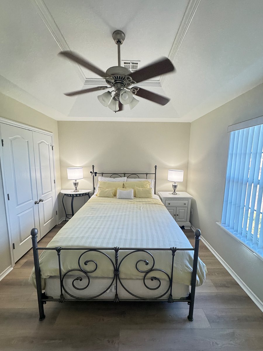 Cozy and quiet 2nd guest room with queen bed, and plenty of natural light.