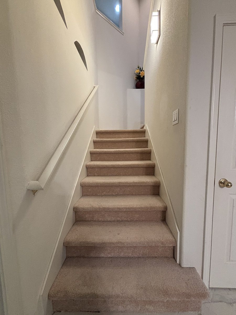 Stairs go to all bedrooms and bathrooms on the second floor.