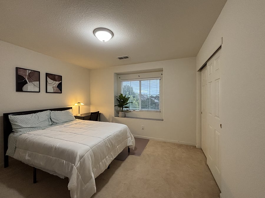 Second bedroom with a desk