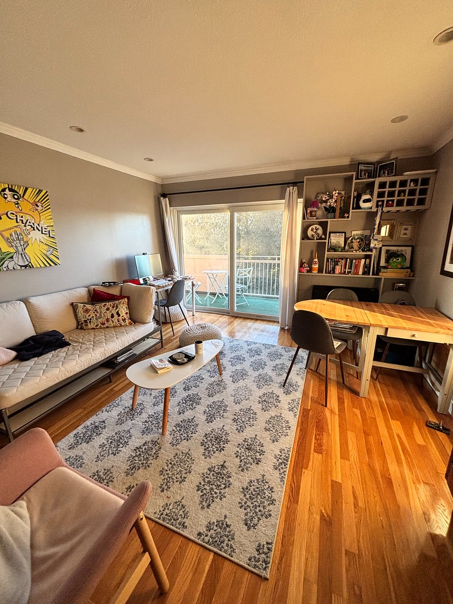 Comfortable sofa and coffee table, designated work area with view