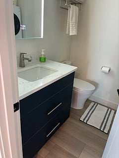 Bath with Shower and Washer and Dryer