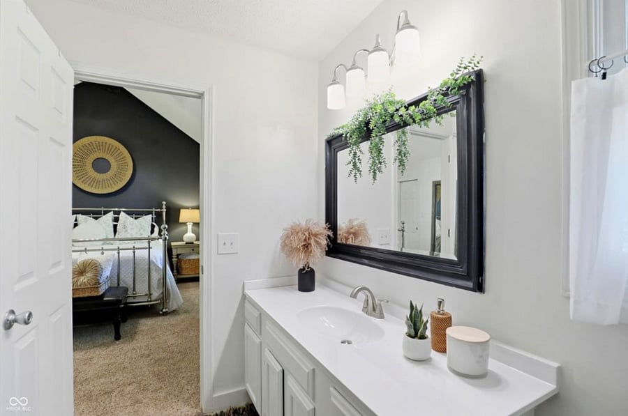 Primary bathroom with extra closet. 