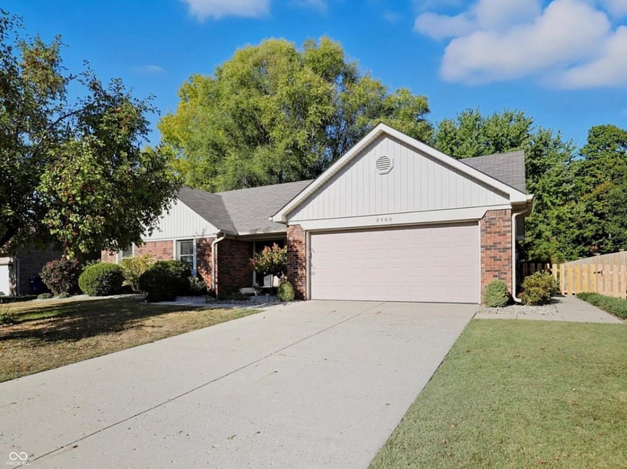 Attached 2 car garage with storage. 