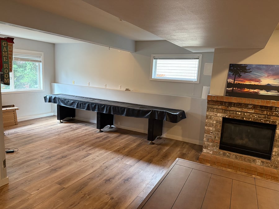 Shuffle board table (landlord may sell). Fireplace not currently turning on-looking into it)