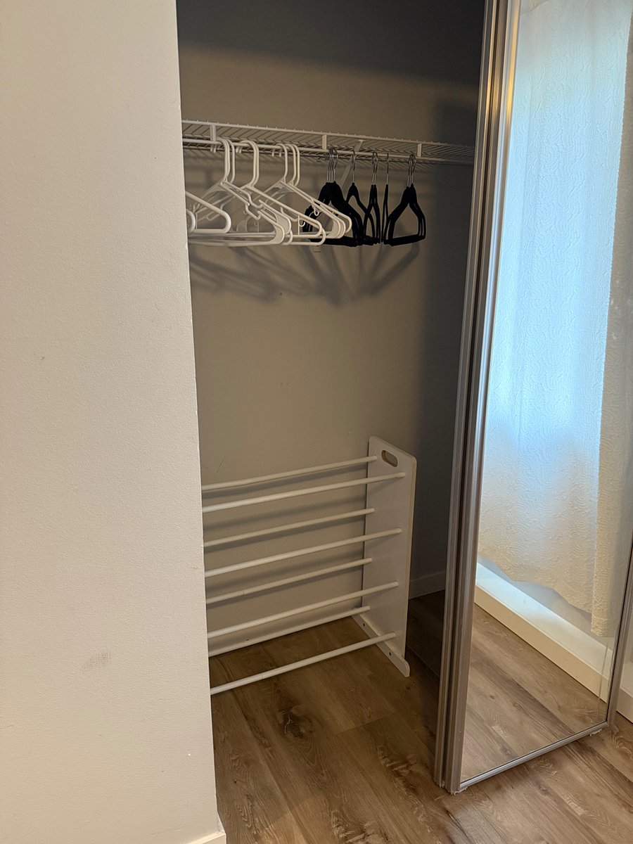 Closet. Need to get doors put back on-off tracks. Happy to add a cubby for shelving.
