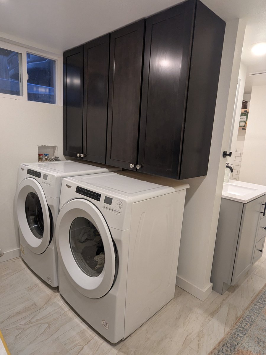 Basement laundry - Whirlpool appliances and lots of storage