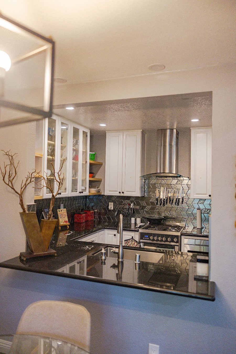 Full Kitchen. Comes with all utensils and dishes, spices, starter food supplies, including dried and canned staples. Features a dishwasher, a large fridge, a tucked-in microwave, Brita water filter, toaster, oven, stove, coffee maker, crockpot/Instant Pot, and more kitchen appliances. Ample storage for tenants' food goods in kitchen cabinets and in the walk-in pantry.