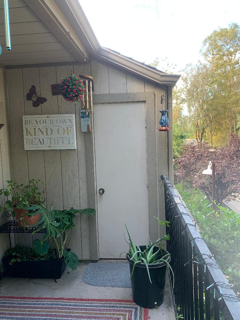 Patio. Includes two outdoor chairs, a hummingbird feeder, windchimes, beautiful green plants, and a storage closet. (Plants can be removed for pet safety. Please mention if you'd like any plants removed at booking.)
