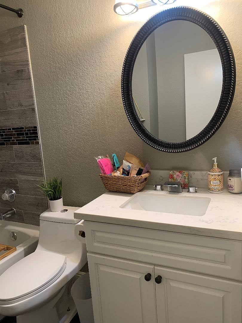 Secondary Bathroom, located directly across from the secondary bedroom. Comes with starter toiletries and bath salts, hair/blow dryer, soaps, towels, and a tub.Secondary Bathroom, located directly across from the secondary bedroom. Comes with starter toiletries and bath salts, hair/blow dryer, soaps, towels, and a tub.