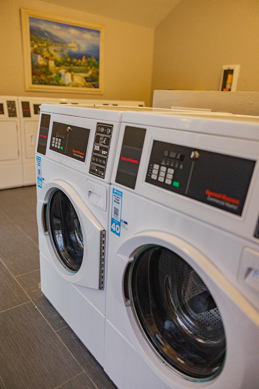 On Premises Laundry Room less than 150 feet from Condo (2 minute walk). 5 Large Capacity Washing Machines ; 6 Large Capacity Dryers. Open 24 hours. Only accessible with a key provided to Tenant(s). $1.75 to Wash / $1.75 to Dry. Tenants' rent comes with a $50 laundry card, so your first $50 worth of laundry is free!