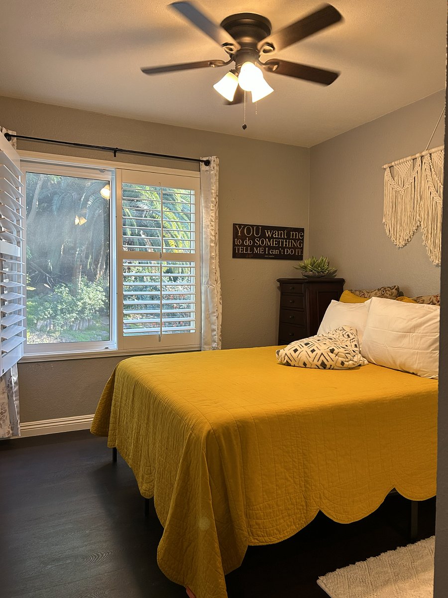 Secondary Bedroom, fully lit.