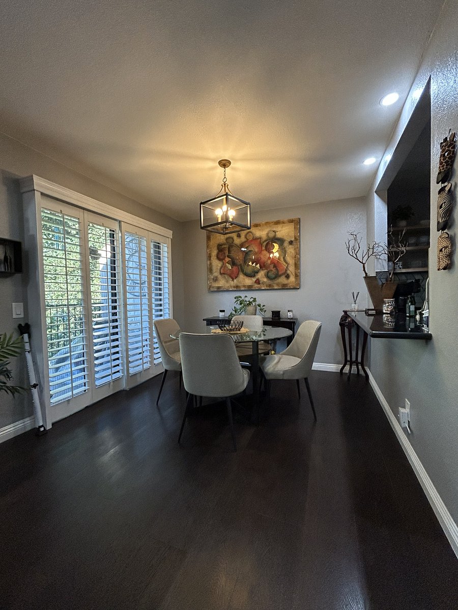 Dining Room. Light from the patio brightens up this area for group meals or taking a meeting on your laptop.