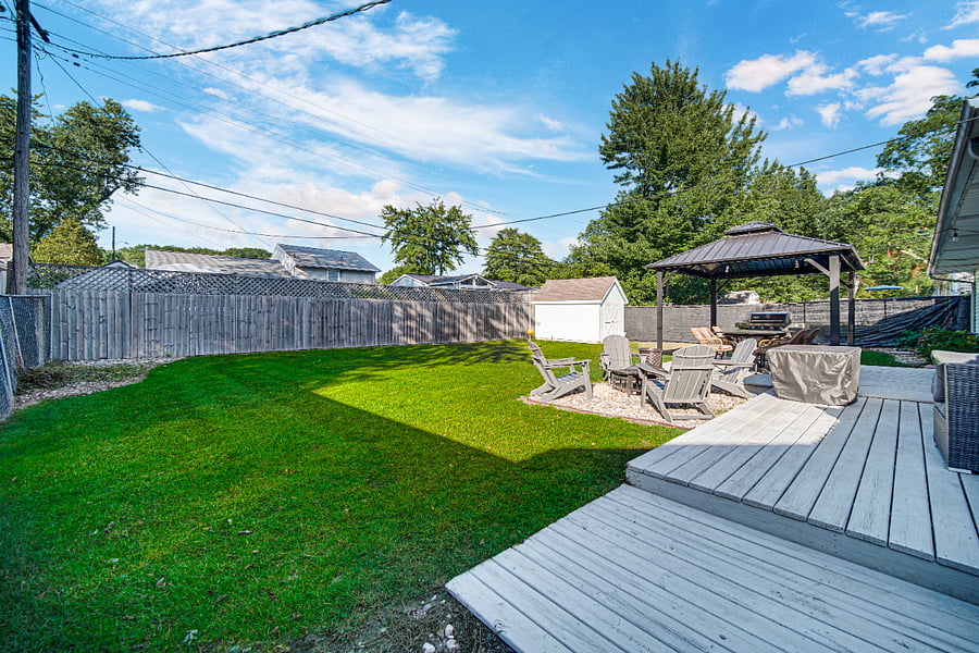 Fenced in back yard, room for kids to play with the stocked shed nestled in the back corner of the property.