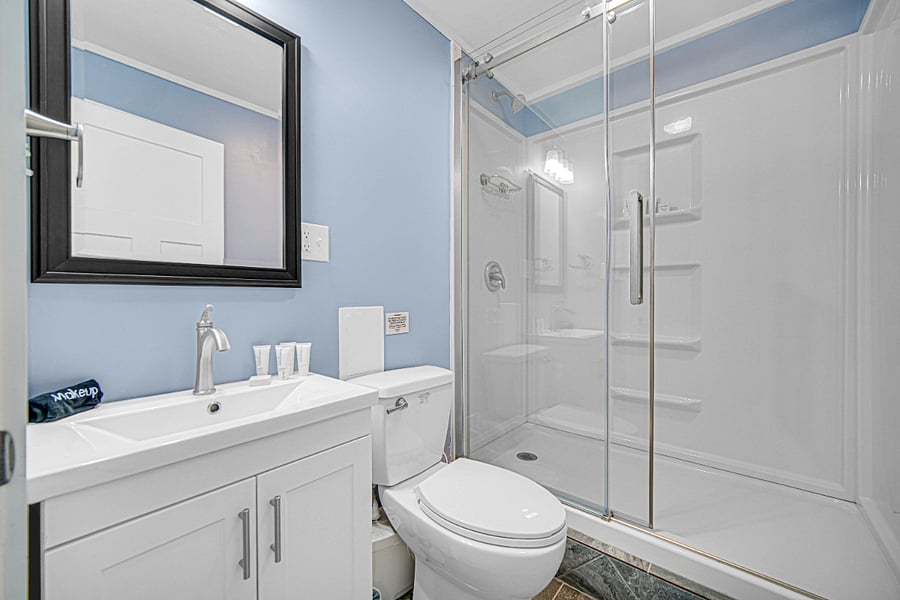 Extra guest full bathroom with bathtub.
