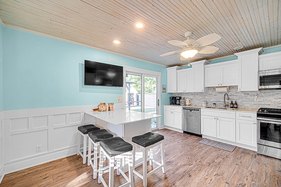 Breakfast nook sitting or extra food prep area.