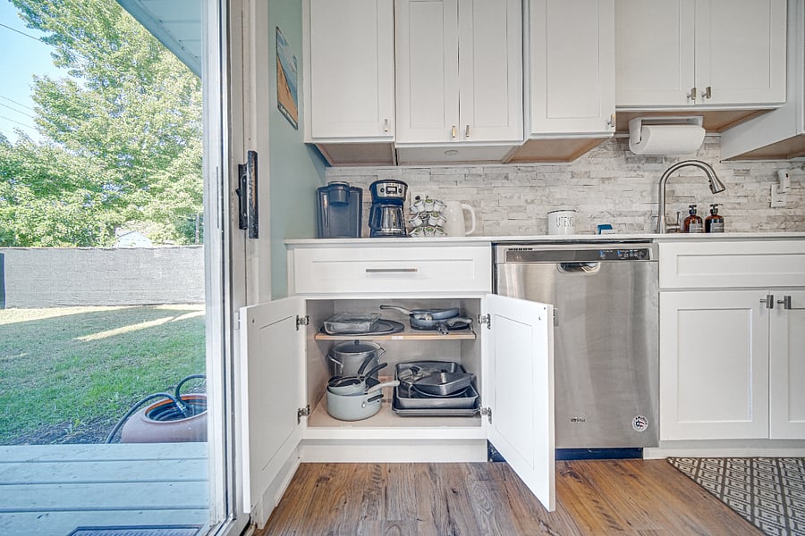 Kitchen stocked with pots and pans.