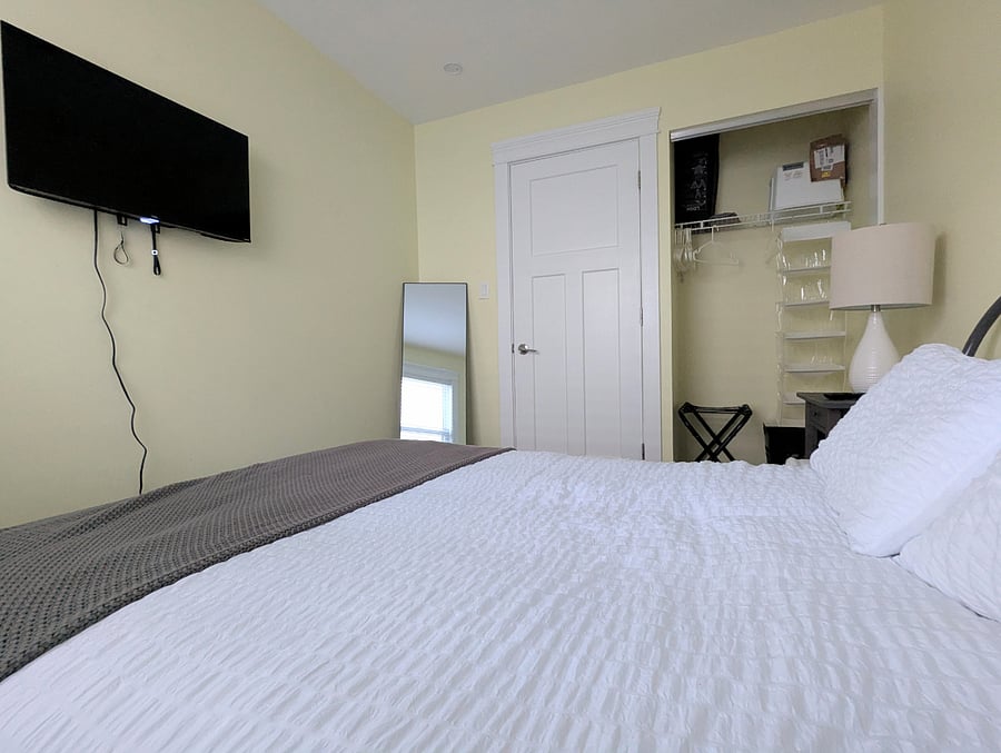 Guest Bedroom 1, closet and doorway view.
