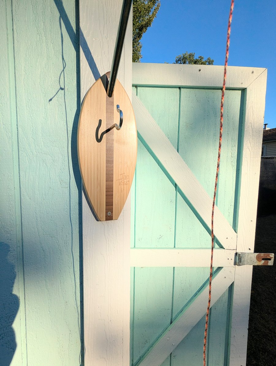 Fun ring-on-a-string game perfect for friendly competition outside.