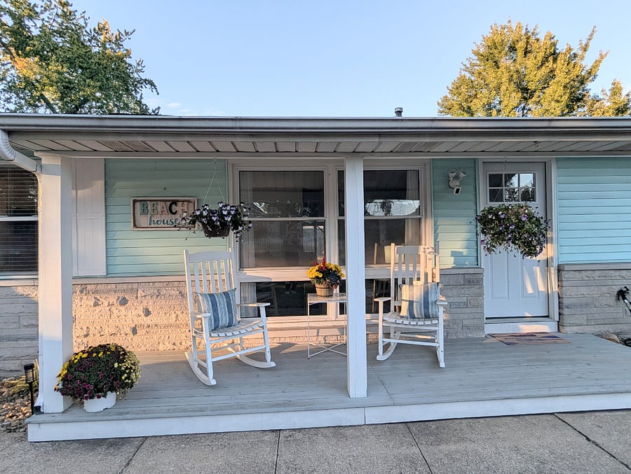 Charming front porch with cozy rocking chairs the perfect spot to unwind.