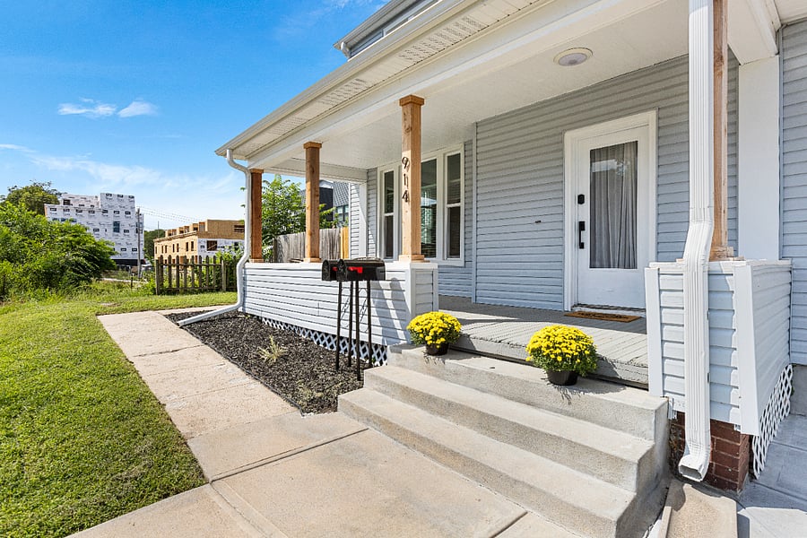 Covered front porch and seating for relaxing!