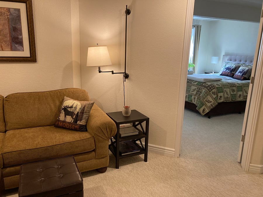 Basement den looking into bedroom.