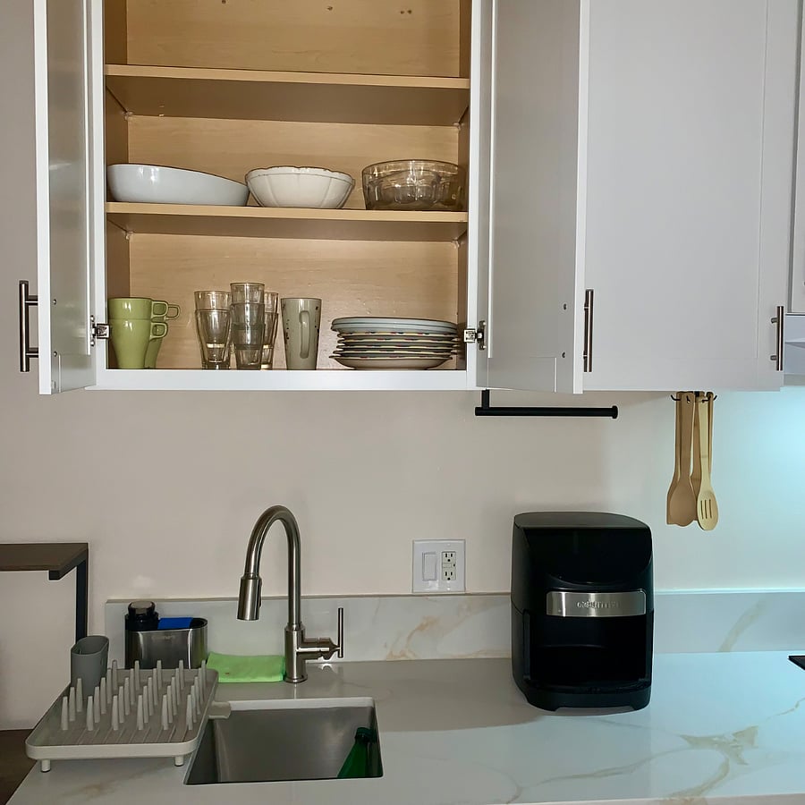 Fully furnished kitchen with dishes, cookware, and silverwareeverything you need to cook and enjoy your favorite meals with ease.