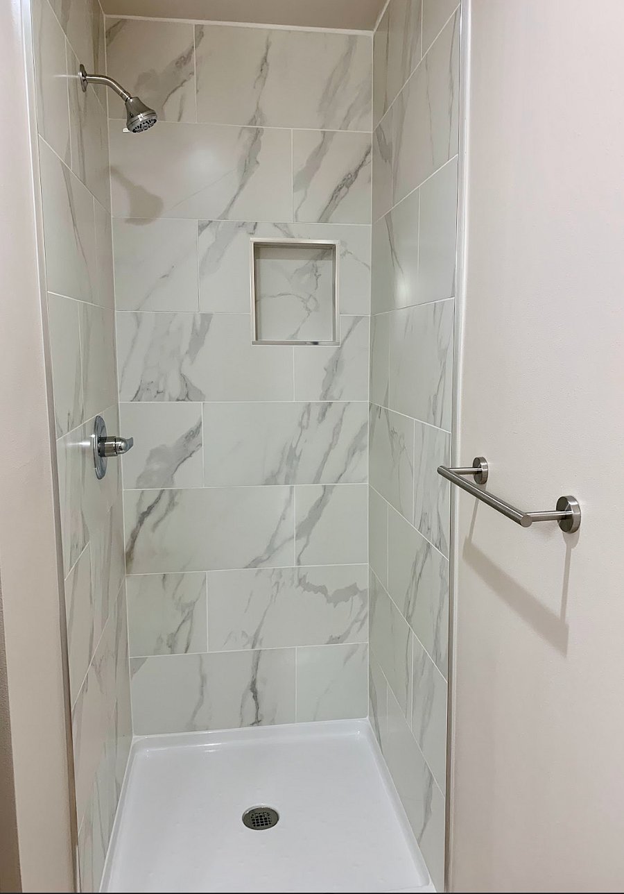 Newly built, spacious, and functional shower designed for comfort and convenienceperfect for a refreshing start or relaxing end to your day.