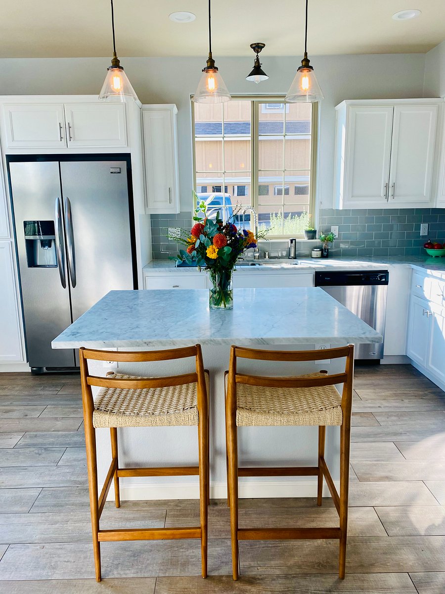 Spacious kitchen island with bar seating  perfect for casual meals. (Not pictured: breakfast table by front window)