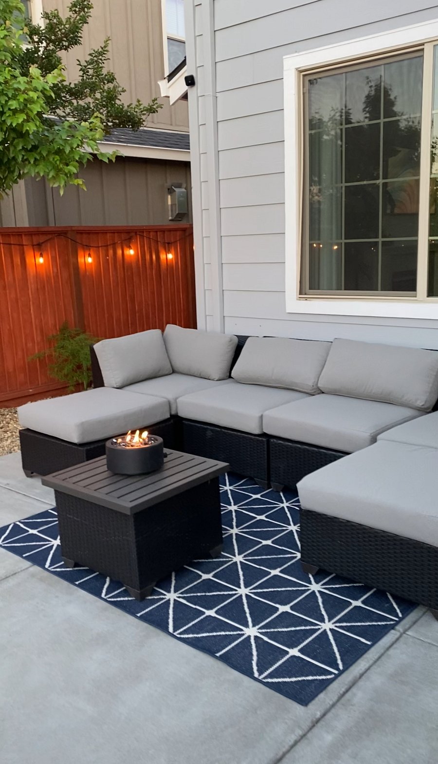 Private backyard with outdoor seating.