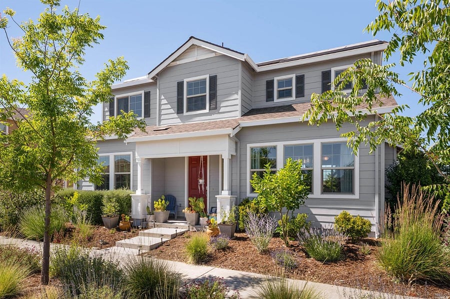Front exterior of the home in a quiet Coffey Park neighborhood.