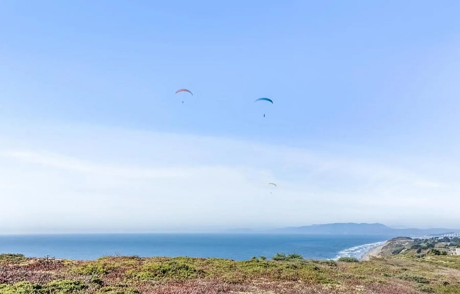 Watch paragliding from living room- often on clear days