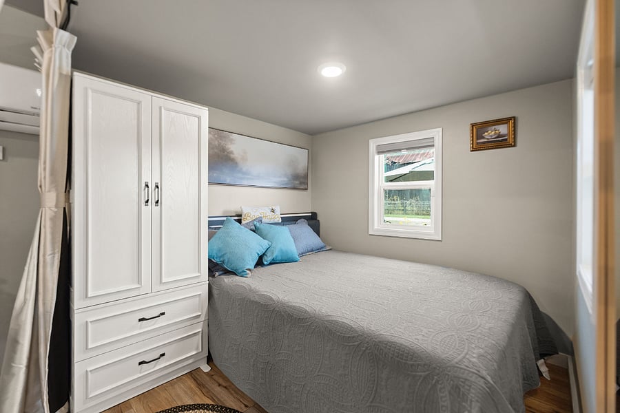 Cozy bedroom nook with new comfy mattress.