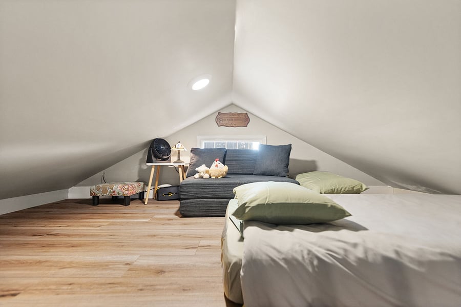 Visiting kids can stay in the 10x10 loft with transforming twin mattress couches or use the loft area for storage.