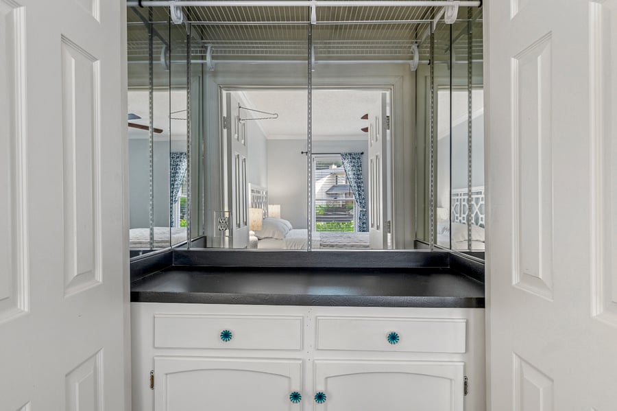 Main Floor Suite. Mirrored Closet and Drawers