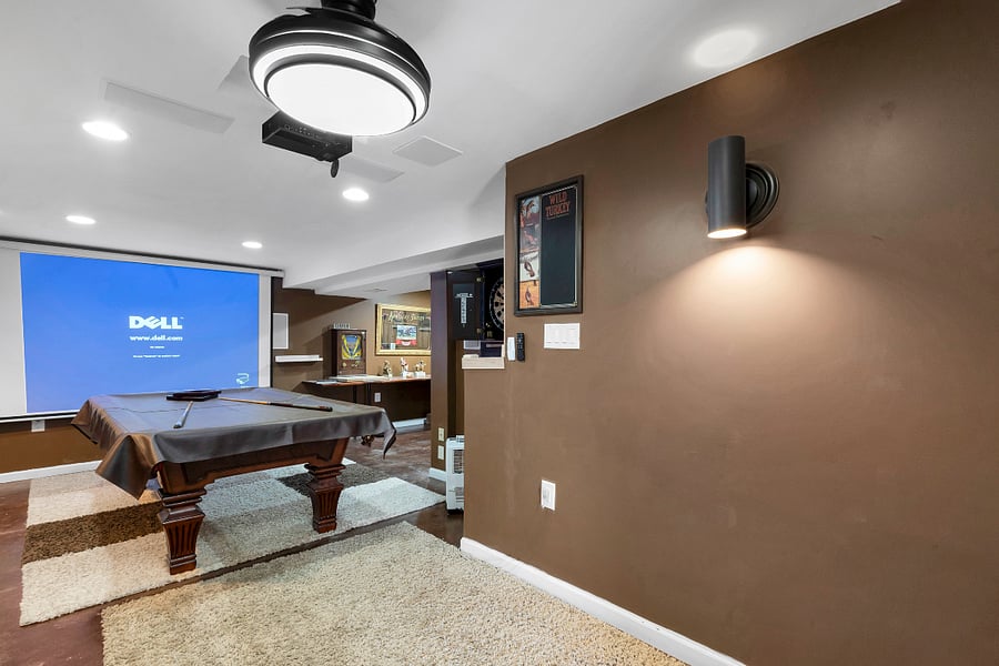 Motorized projector screen with overhead projection