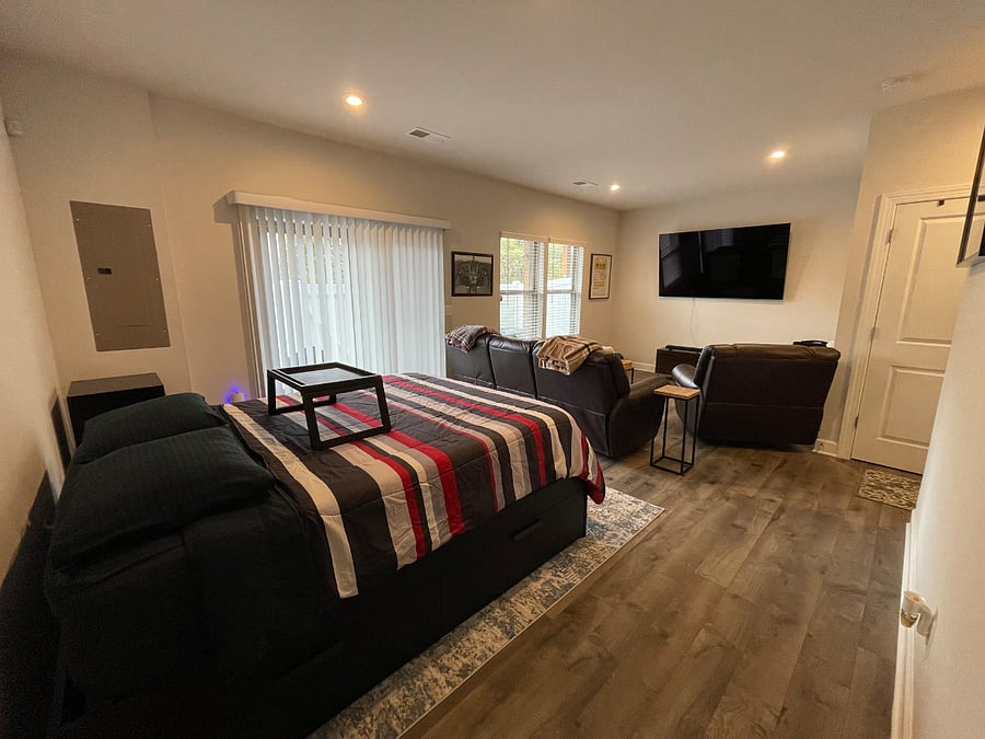 Spacious "studio" style layout with private sitting area and sleeping area. Private access to furnished enclosed patio.