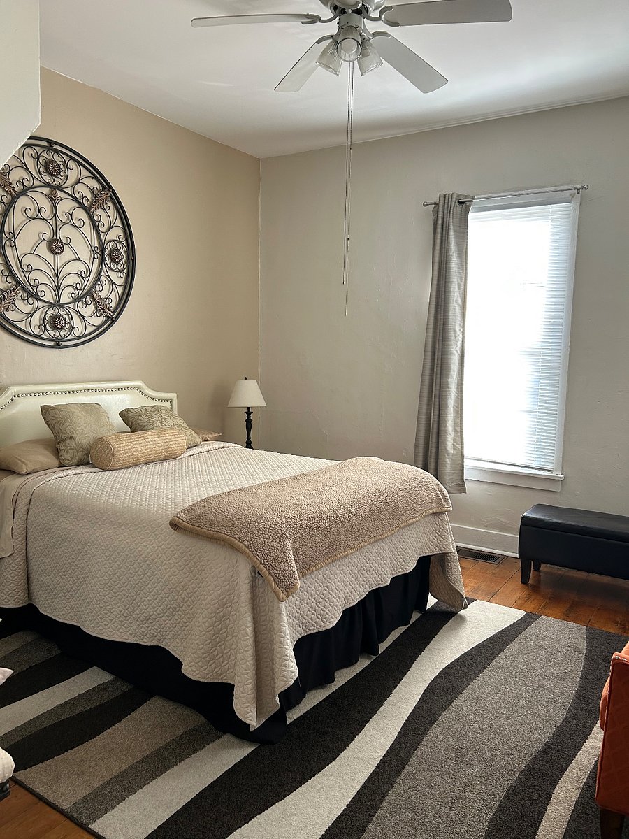 Front bedroom. Queen has door to bath. Black out curtains
