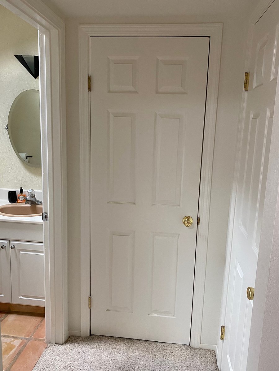 Two hallway closets for linens & clothing