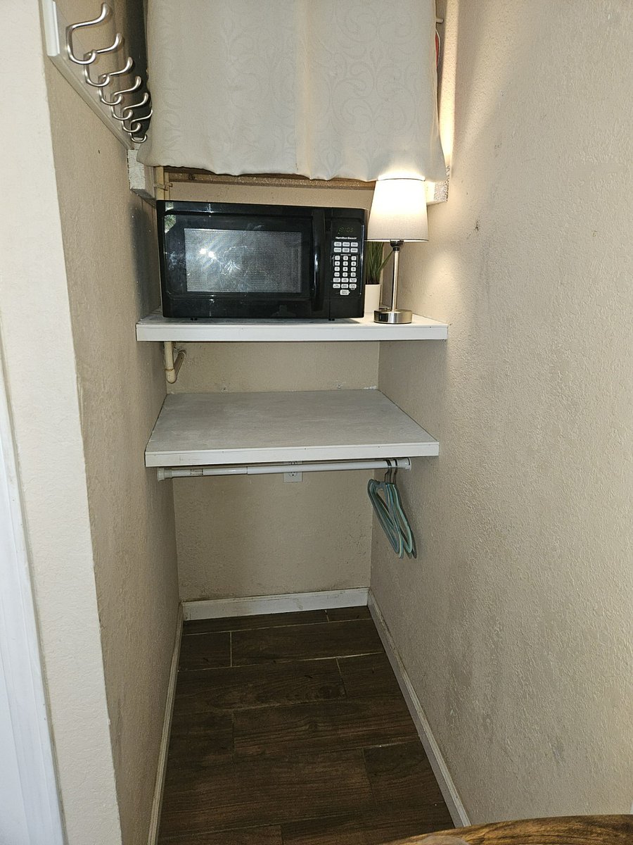 Microwave, storage shelf & hanging closet