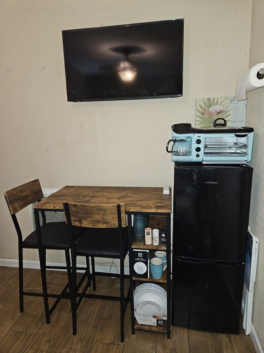 Table/Desk with barstools
Larger than a mini fridge plus freezer
Cook station with coffee maker, toaster oven and grill top